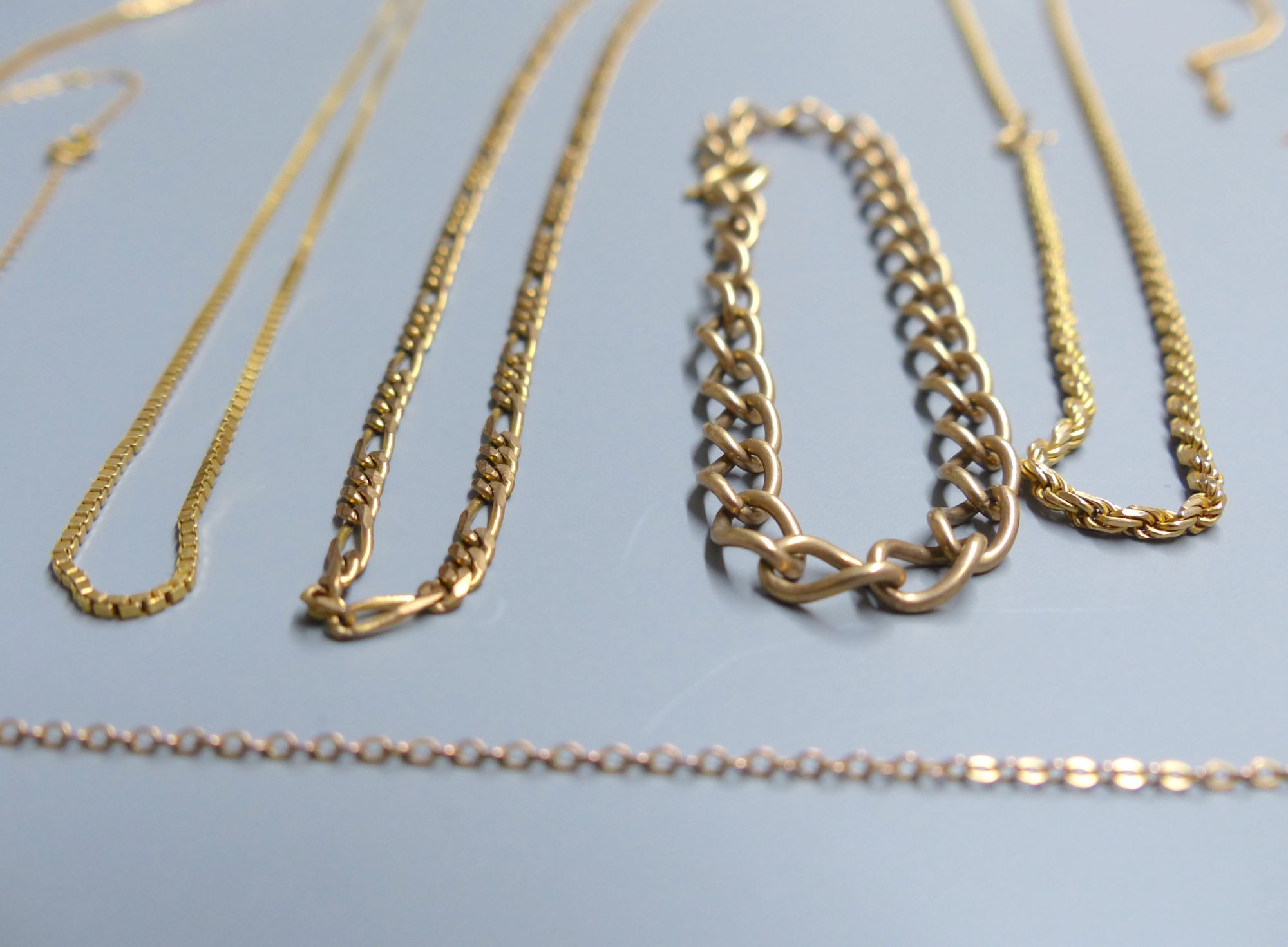 Five assorted modern 9ct chains (three a.f.) and a 9ct bracelet,